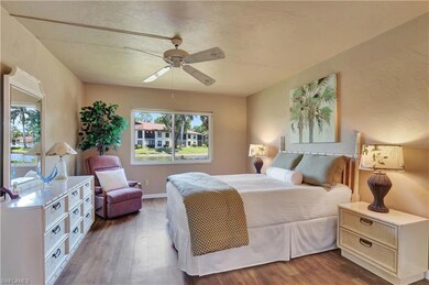 Main Bedroom with ceiling fan, and vinyl wood look