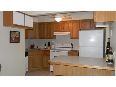 Kitchen With Extra Cabinets and Breakfast bar