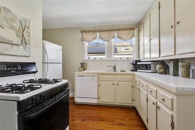 Kitchen cabinets have been painted white