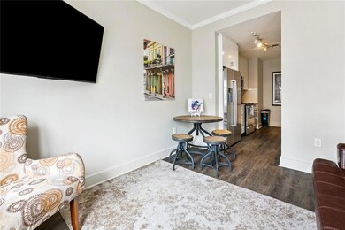 Living space opens to kitchen