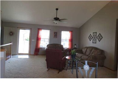 spacious living room with vaulted ceilings