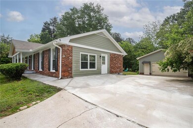 View of home's exterior featuring brick siding and