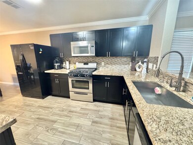 12411 Meadow Frost Ln, Houston, TX 77044 - photo 5