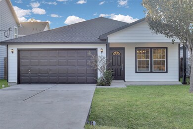 This home's entry is the focal point of its Curb A