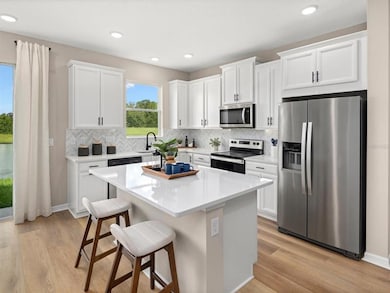 *Photo of Model Home - Kitchen*