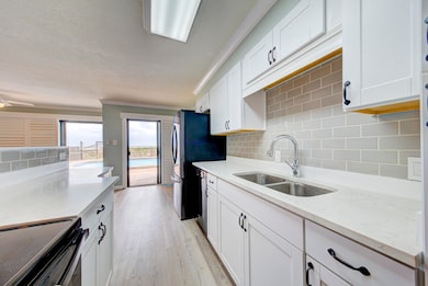 kitchen with view of pool