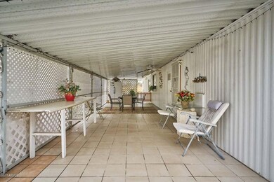 Covered Patio-West Side[8076] Carport co