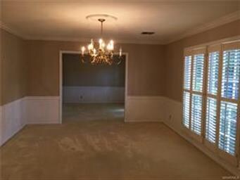 Beautiful and spacious dining room. Notice the pla