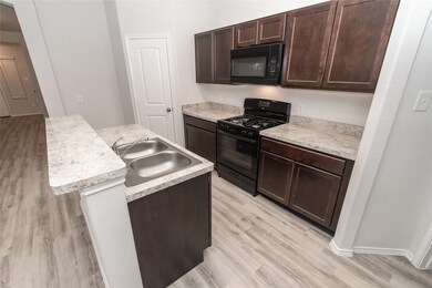 13633 Briana Brook Ct, Willis, TX 77378 - photo 4