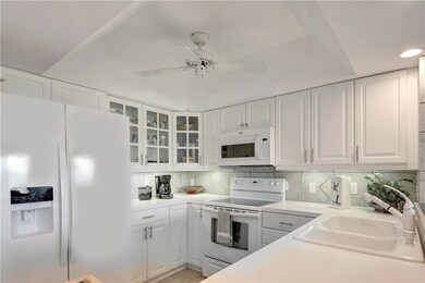 Modern kitchen with tile backsplash
