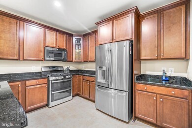 24636 Woolly Mammoth Terrace unit E-203, Aldie, VA 20105 - photo 2