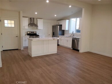 Remodeled kitchen 0 white cabinets / island