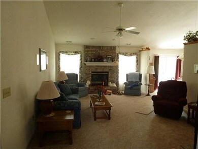 Living Room. Wonderful brick hearth fireplace with gas log, no more mess, ashy wood burning....