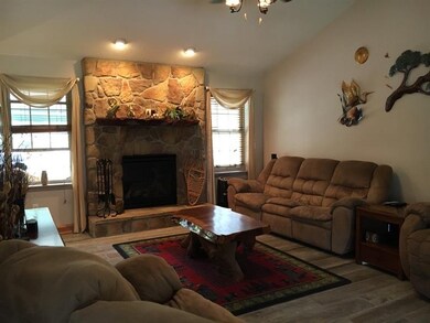 Living Room with stone fireplace