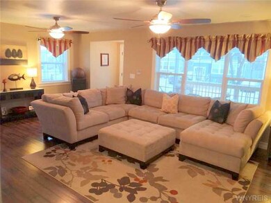 Living Room. Large inviting LR w/new flooring, win
