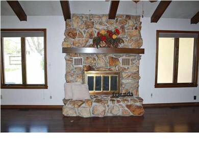 Stone fireplace with gas start and blower. Open pl