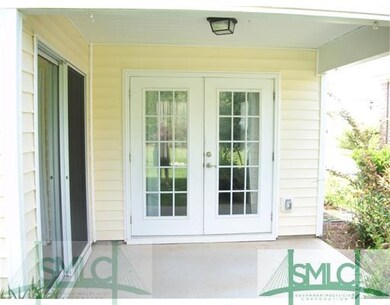 Exterior Back. Covered Back Porch off Kitchen and 