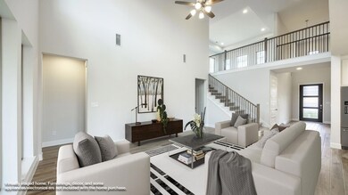 Living room featuring a high ceiling, wood finish