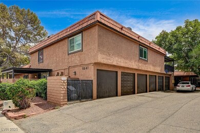 The 2 single car garage doors closest to the car i