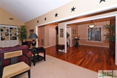 Formal dining room with beautiful hardwood floors 