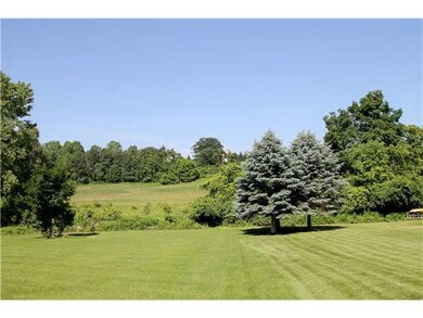 View. The property backs up to a farm and woods, a