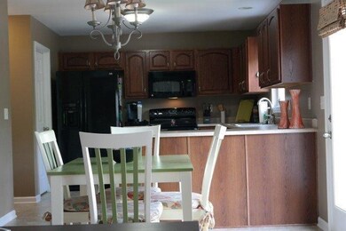 Eat-in kitchen with great view of tree l