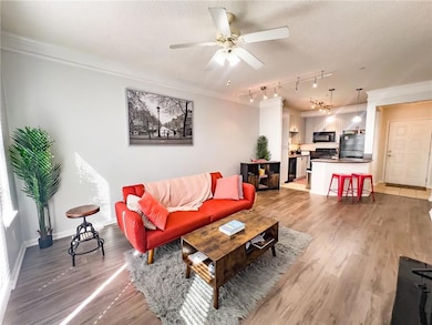Living room featuring light hardwood / wood-style 