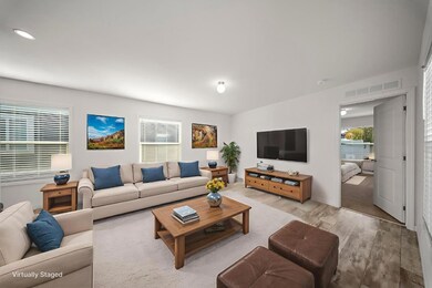 Please note that the image shown is a virtually staged representation of the room and is intended to provide a visual concept of the space. The actual room may differ in appearance, and the furniture and decor depicted are not included in the sale. For an accurate understanding of the property's current condition and layout, we encourage you to view the home in person. Thank you