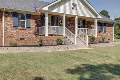 Meticulously kept landscaping welcomes guests to your new home!
