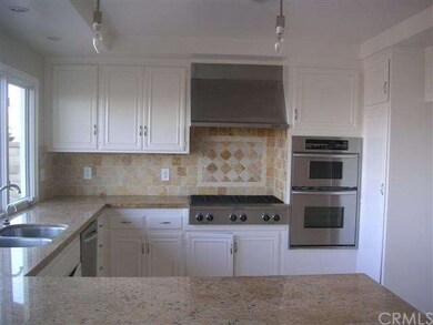 Kitchen with gas range and oven and microwave..  G