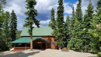 Cabin In The Pine Trees