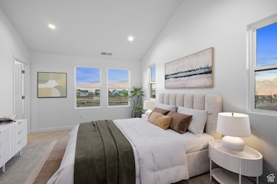 Carpeted bedroom with lofted ceiling, recessed lighting, and multiple windows
