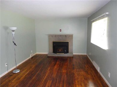 Living Room. Hardwood Floors & Log Burning firepla
