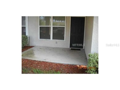 Exterior Back - Quaint patio area for small table, chairs, grill...