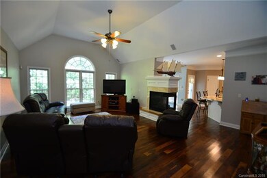 Great Room with Beautiful Hardwood flooring thru o