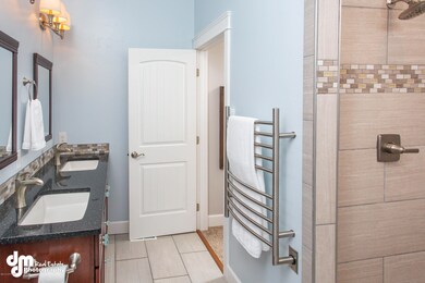 Bath w/ towel warmers and double shower