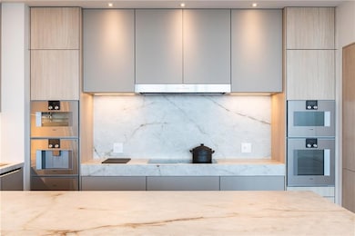 Gaggenau steam and convection oven, microwave and coffee machine along with induction cooktop.