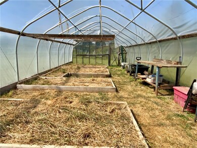 Raised greenhouse beds.
