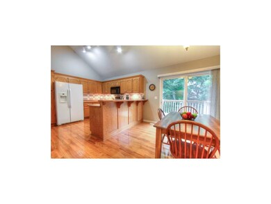 Vaulted ceiling and breakfast bar in kitchen/dinin