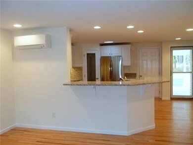 Kitchen. Diagonal breakfast bar/1 of...