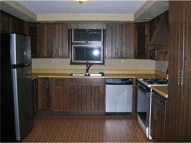 Kitchen. Lots of cabinets and matching built in pa