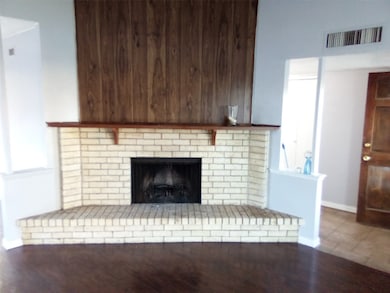 Wood burning brick fireplace