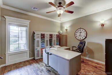 Beautiful wood-trimmed door and crown molding in t