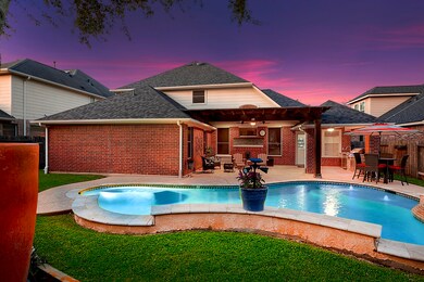 Custom designed Pool, Spa, perfectly placed to fit this Backyard. This pool has many features- Energy Efficient Equipment, Automation and Remote Control, Smart Lighting, Water Features, Heating and Cooling Options, Innovative Materials and Finishes, Automatic Cleaners, Spa and Hot Tub Integration, Custom Design Features.