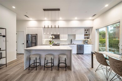 Kitchen featuring appliances with stainless steel 