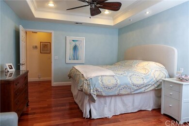 Master bedroom with custom faux paint, hardwood fl