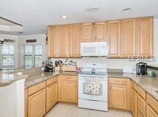 Kitchen with Oversized Maple Cabinets & Granite Co