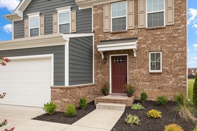 Welcome home to this brick home with great curb appeal! The homeowners have added this easy care landscaping so you can welcome family and friends in style! 