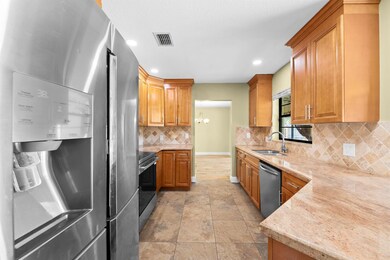 6361 Hollandaire Dr E, Boca Raton, FL 33433 - photo 7