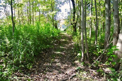 PATH BEHIND HOUSE LEADING TO RIVER